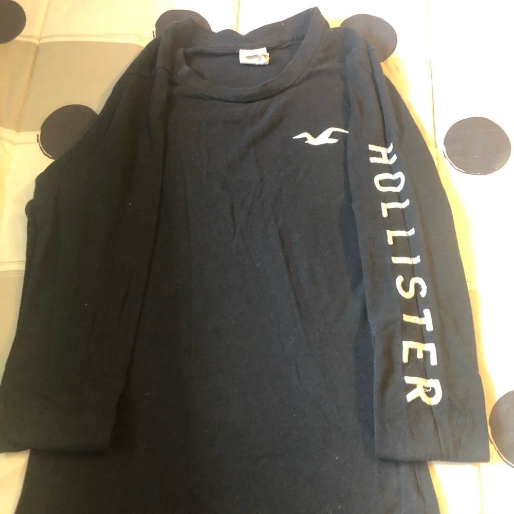 Dark blue long sleeve shirt .